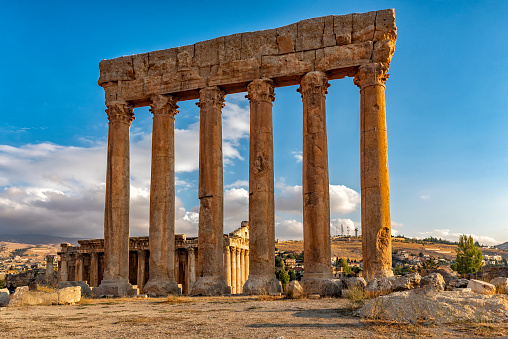 The six columns remaining of the temple of Zeus in Baalbek in Lebanon at sunset