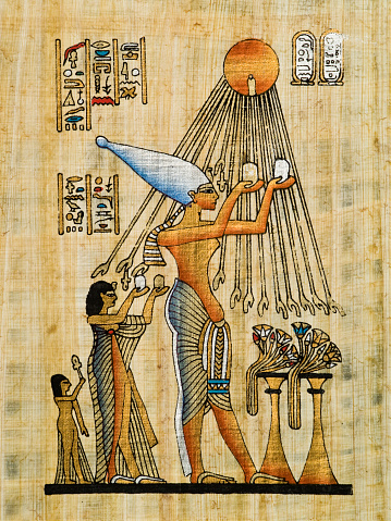 Akhenathen, Nefertiti and Meritaton making a water's offering to Aton (Re)